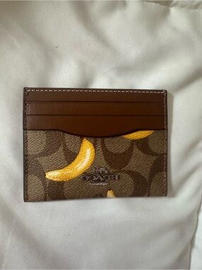 COACH banana print skinny card holder